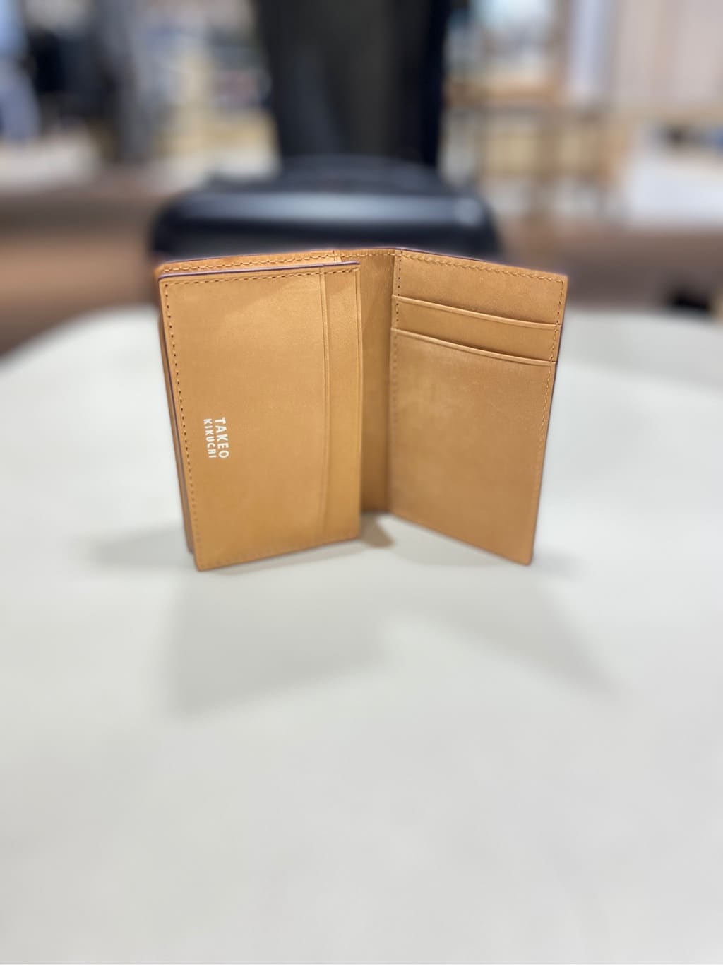 わいずみさんの「TAKEO KIKUCHI｜【ソフト＆ナチュラル】ミニメッシュ レザー 名刺入れ」を使ったコーディネート