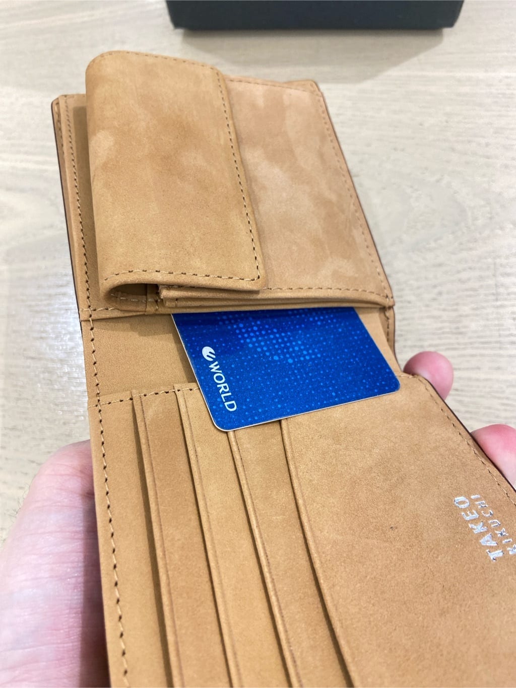 わいずみさんの「TAKEO KIKUCHI｜【ソフト＆ナチュラル】ミニメッシュ レザー 2つ折り財布」を使ったコーディネート