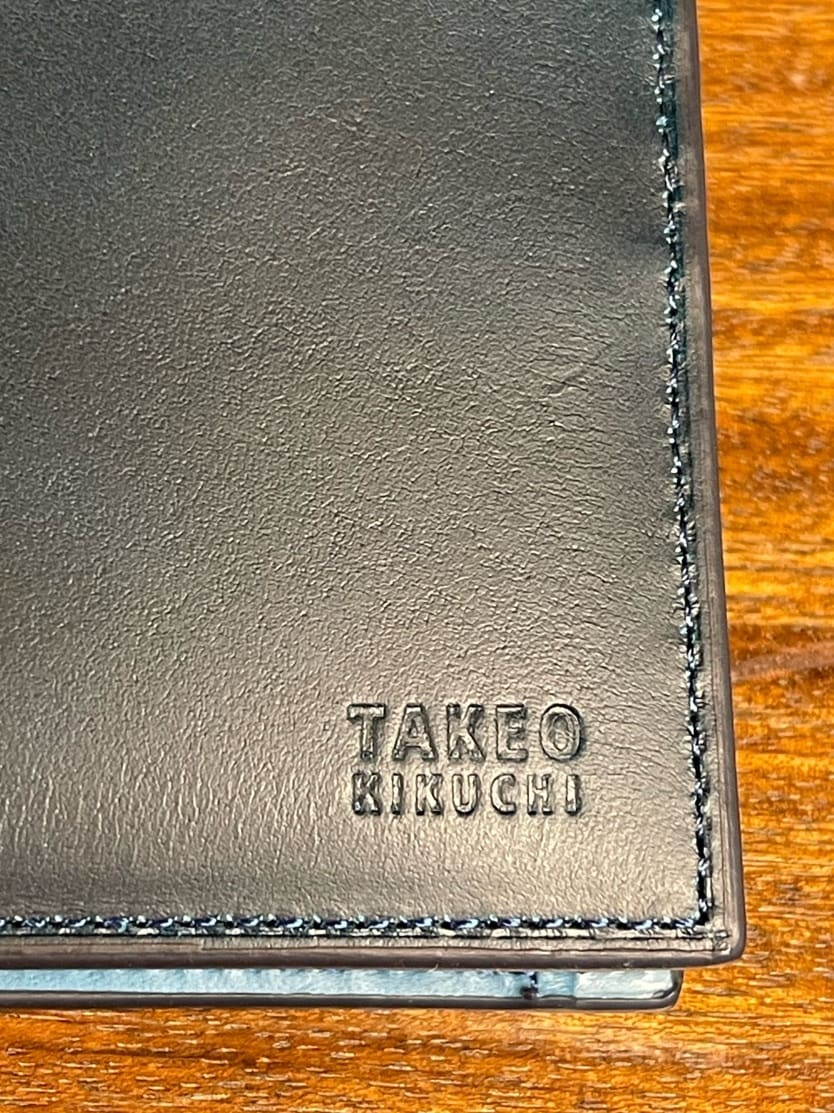 iwさんの「TAKEO KIKUCHI｜アンティーク調レザー 2つ折り財布」を使ったコーディネート
