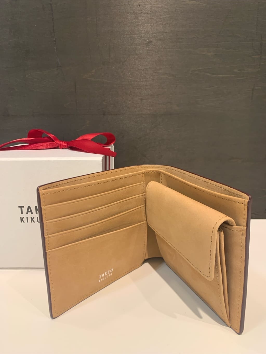 木村剛さんの「TAKEO KIKUCHI｜【ソフト＆ナチュラル】ミニメッシュ レザー 2つ折り財布」を使ったコーディネート