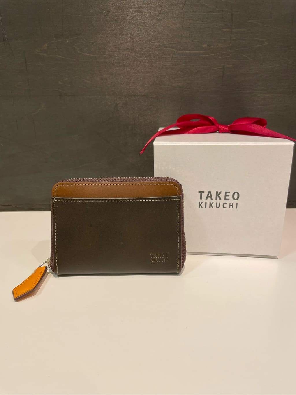 すずきさんの「TAKEO KIKUCHI｜アンティーク調レザー コインケース」を使ったコーディネート