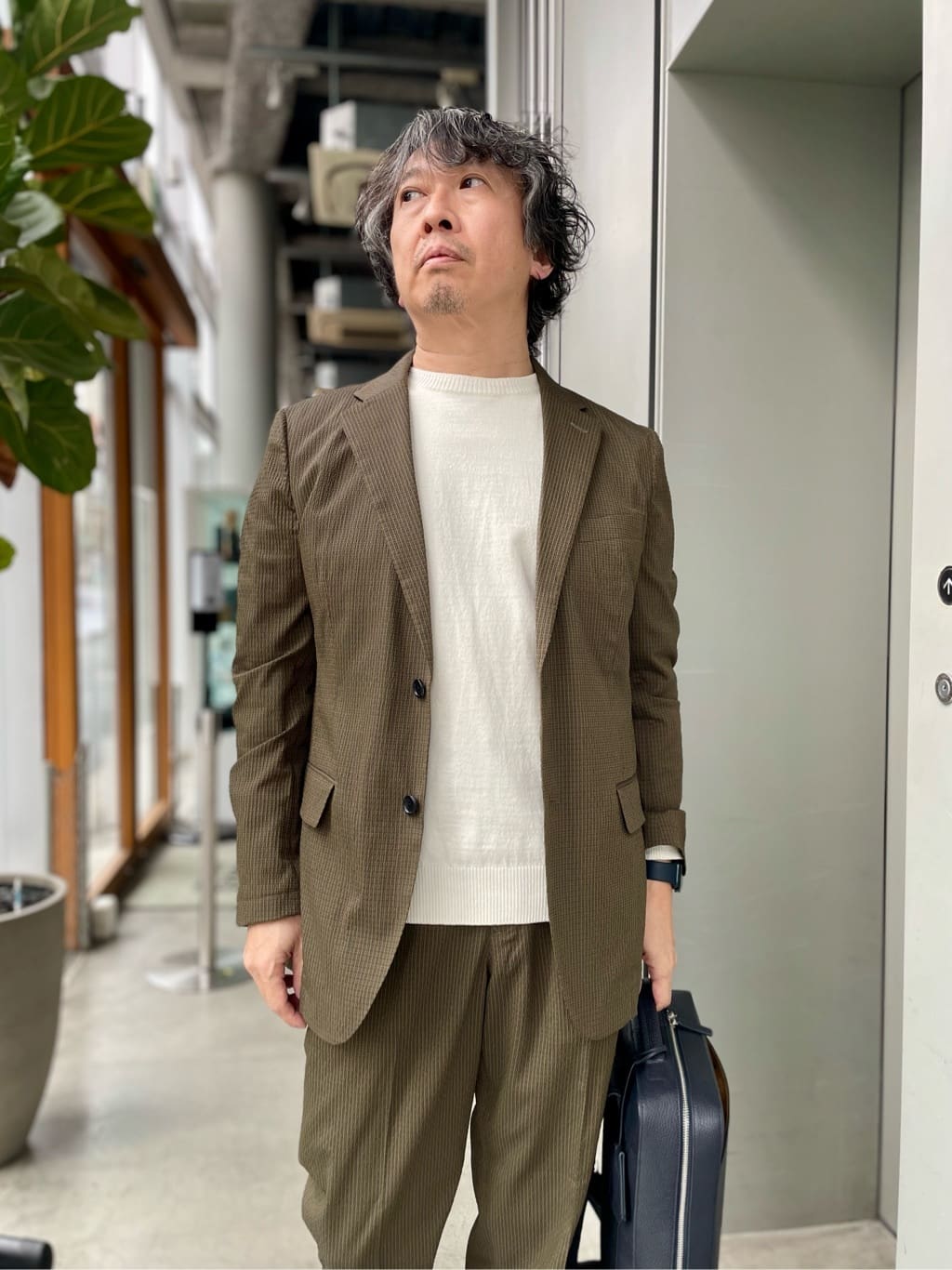 デザイナーTAKEman さんの「TAKEO KIKUCHI｜フルベジタンニンレザー バックパック」を使ったコーディネート