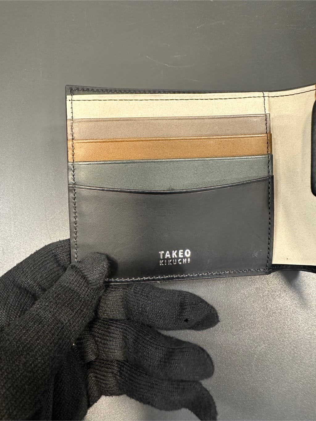 Uさんの「TAKEO KIKUCHI｜アンティーク調レザー 2つ折り財布」を使ったコーディネート