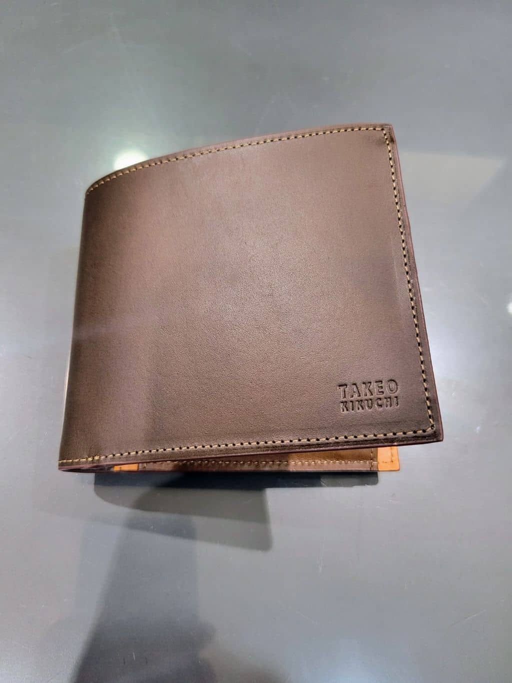 piroyaさんの「TAKEO KIKUCHI｜アンティーク調レザー 2つ折り財布」を使ったコーディネート