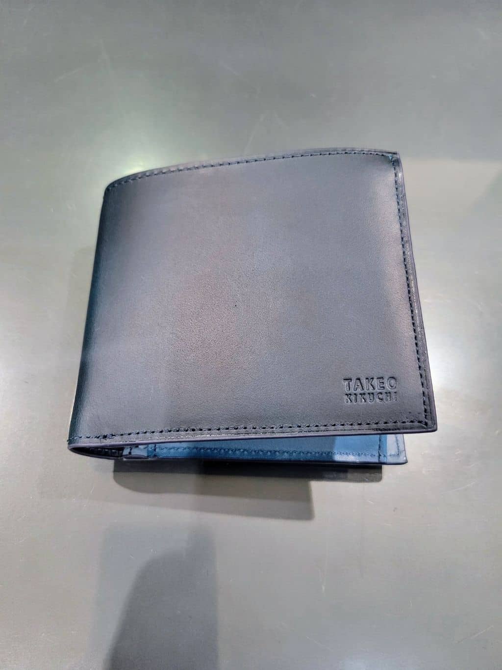 piroyaさんの「TAKEO KIKUCHI｜アンティーク調レザー 2つ折り財布」を使ったコーディネート