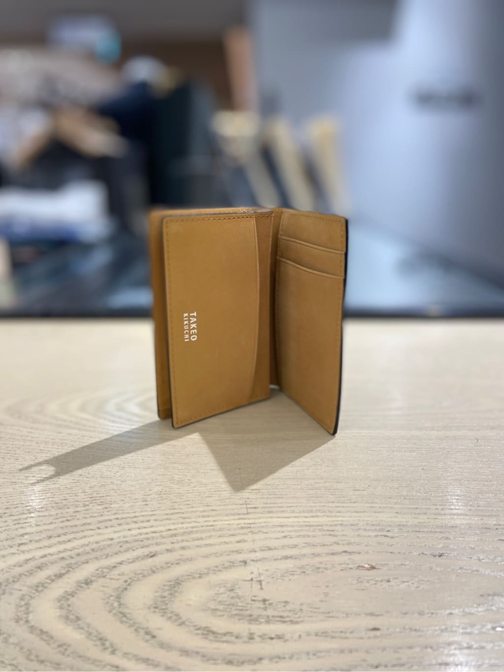 わいずみさんの「TAKEO KIKUCHI｜【ソフト＆ナチュラル】ミニメッシュ レザー 2つ折り財布」を使ったコーディネート