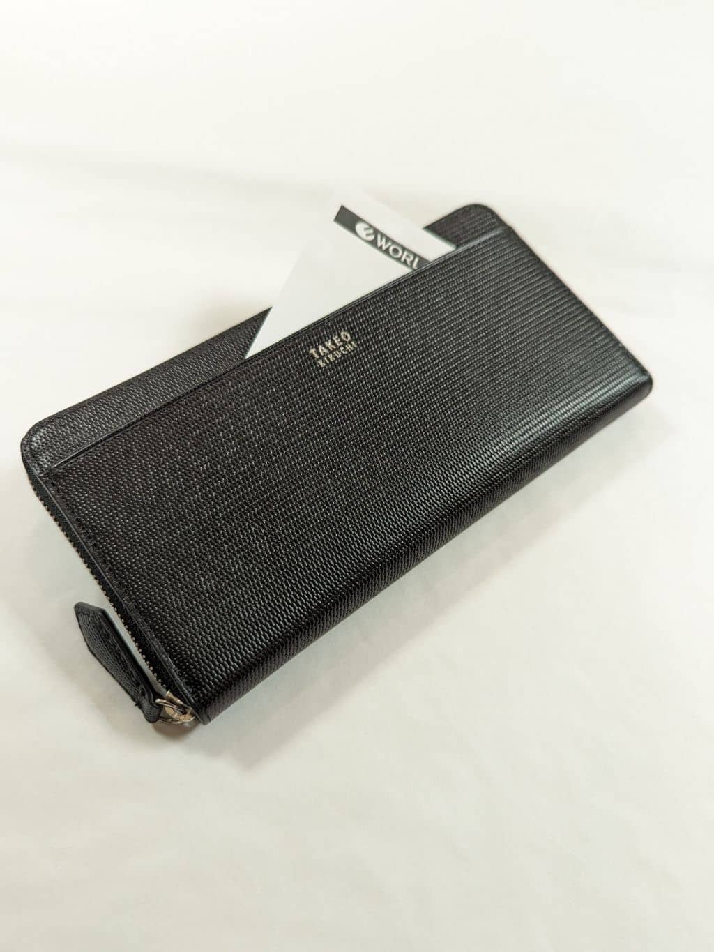 yasuさんの「TAKEO KIKUCHI｜【ソフト＆ナチュラル】ミニメッシュ レザー　ラウンドファスナー長財布」を使ったコーディネート