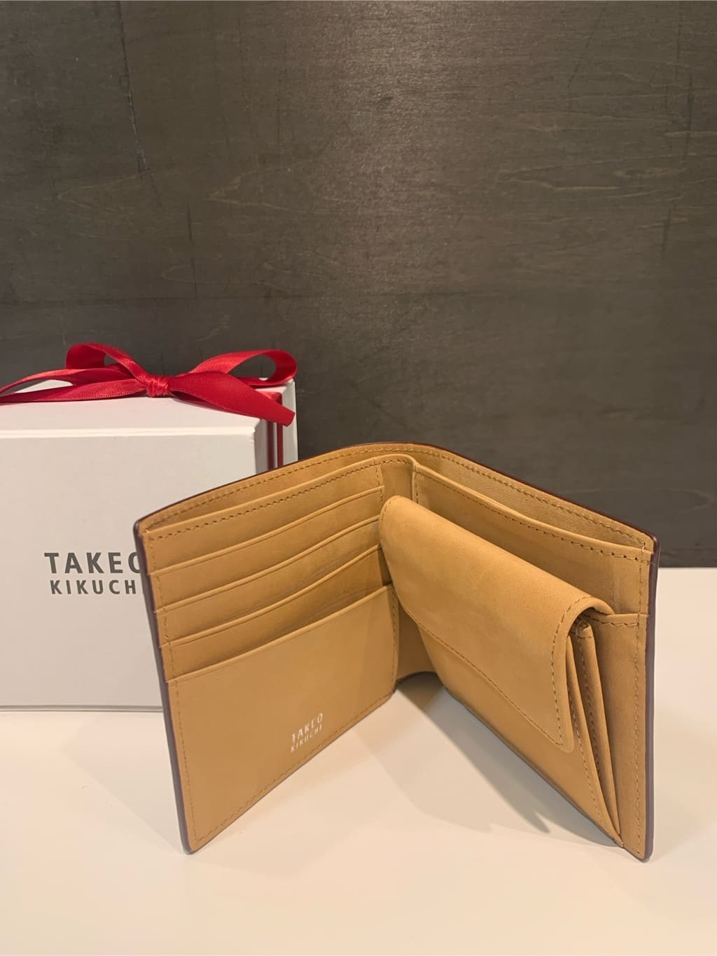 木村剛さんの「TAKEO KIKUCHI｜【ソフト＆ナチュラル】ミニメッシュ レザー 2つ折り財布」を使ったコーディネート