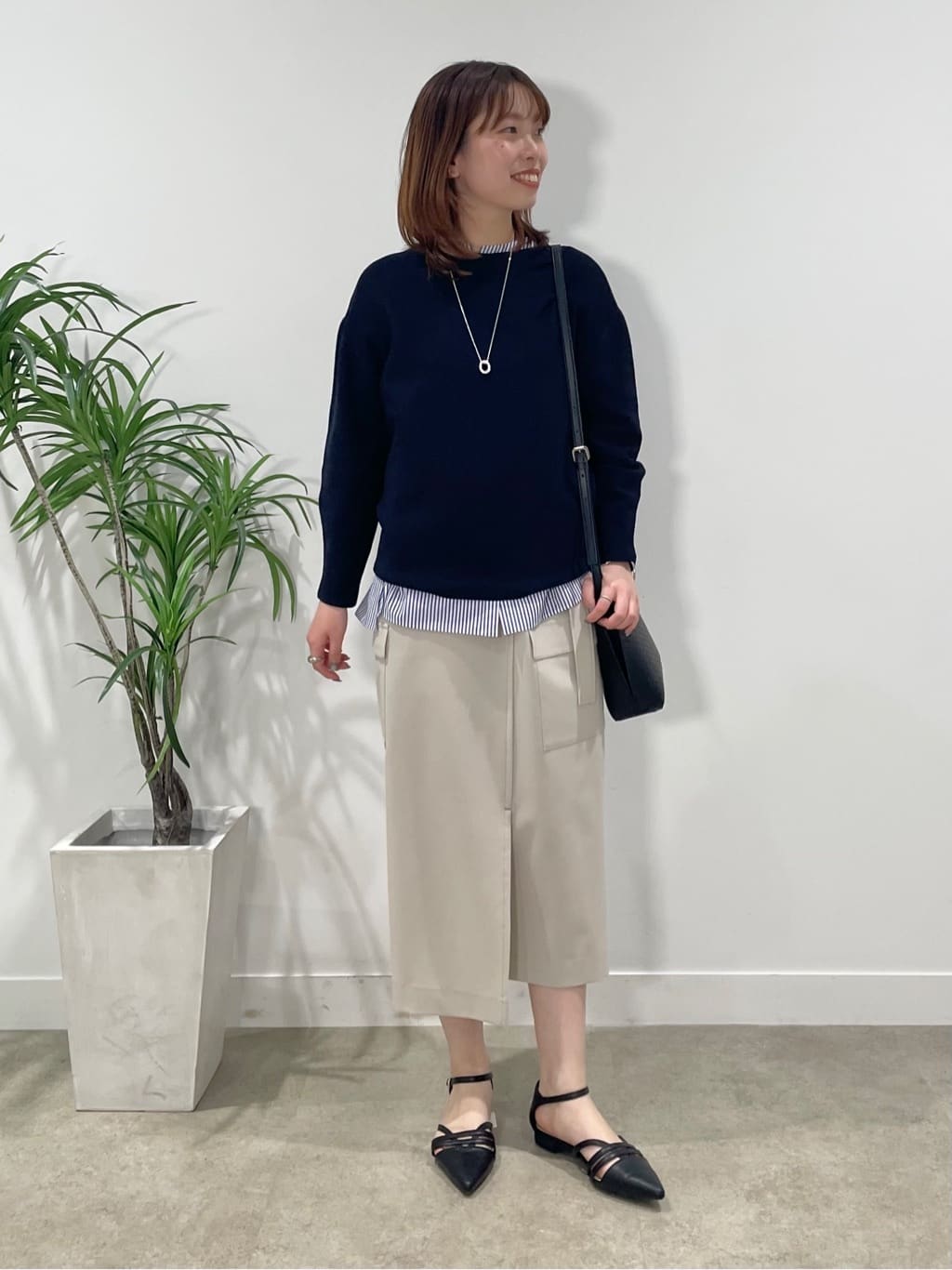ねねさんの「INDIVI｜◆【撥水／UVケア／軽量】トレンチ風ロングコート」を使ったコーディネート