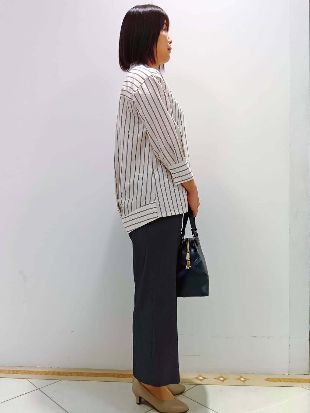 tomoさんの「Reflect｜◆【手洗い可／撥水】ライティミドル丈コート」を使ったコーディネート