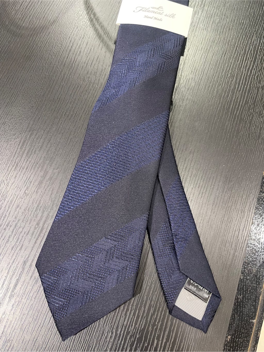 松村泰輔さんの「TAKEO KIKUCHI｜◆【Made in JAPAN】矢絣（やがすり）フィラメントシルク ネクタイ」を使ったコーディネート