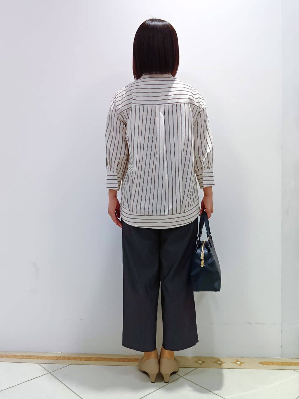 tomoさんの「Reflect｜◆【手洗い可／撥水】ライティミドル丈コート」を使ったコーディネート