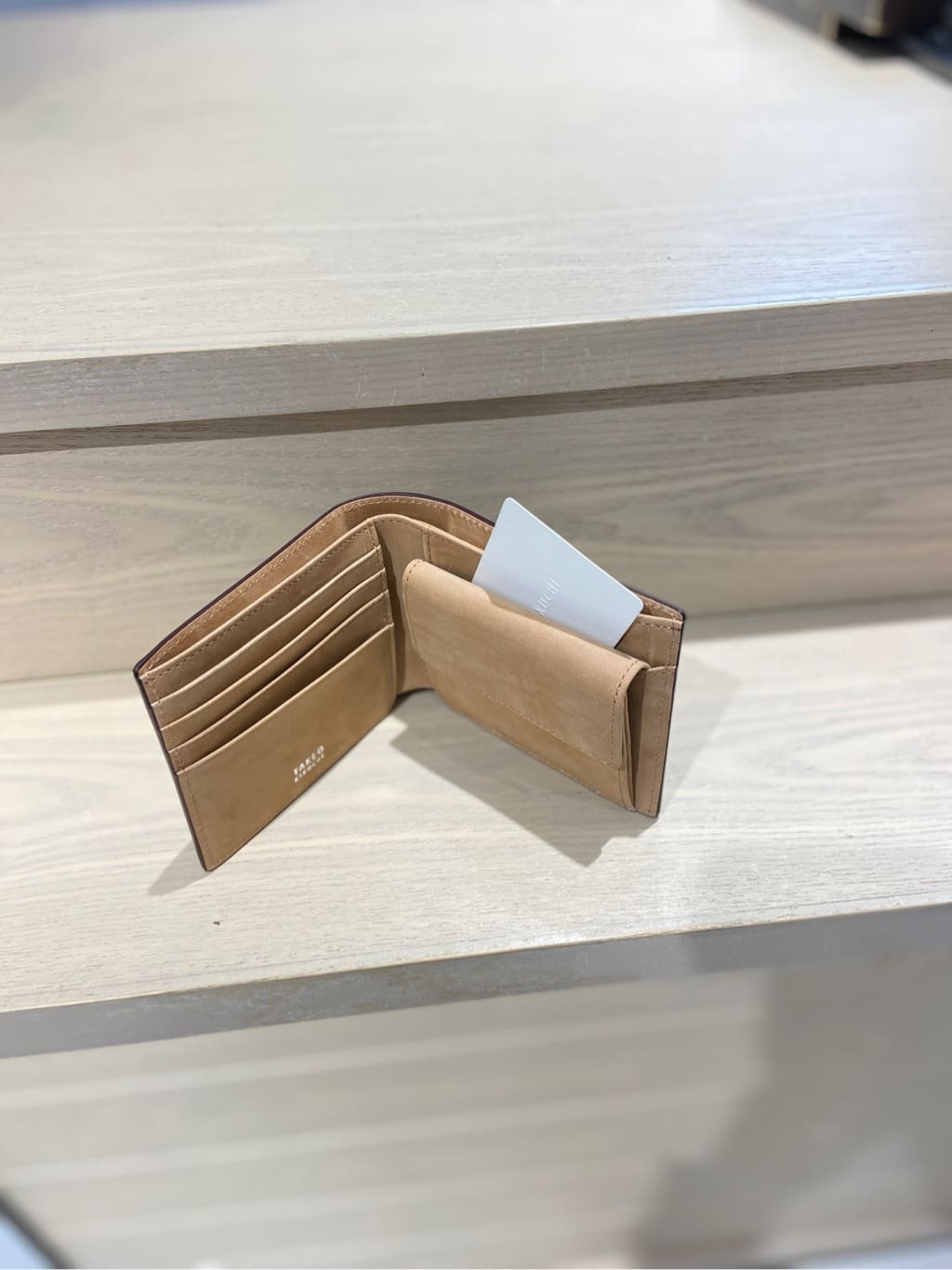 わいずみさんの「TAKEO KIKUCHI｜【ソフト＆ナチュラル】ミニメッシュ レザー 2つ折り財布」を使ったコーディネート