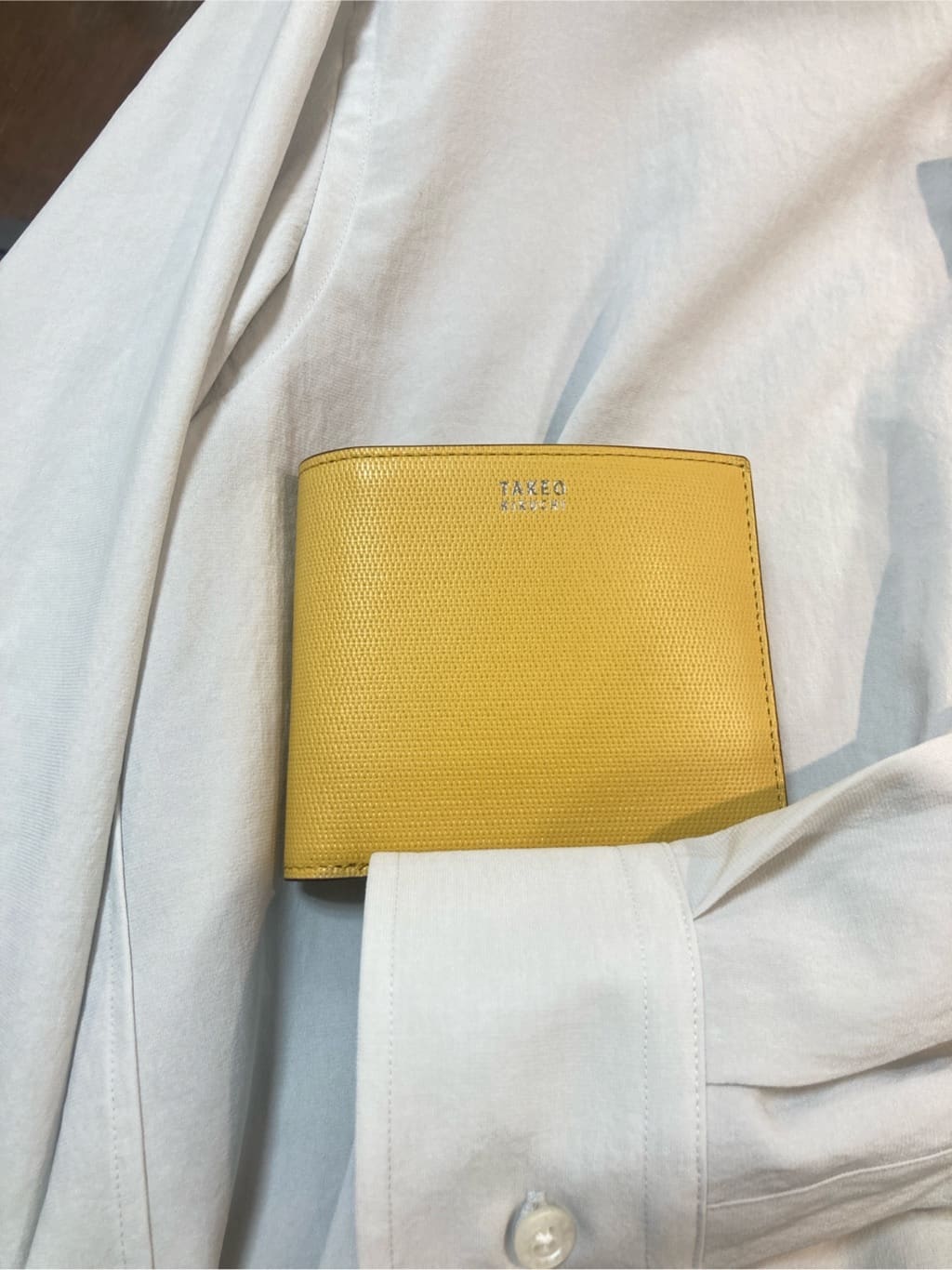 KDDさんの「TAKEO KIKUCHI｜【ソフト＆ナチュラル】ミニメッシュ レザー 2つ折り財布」を使ったコーディネート