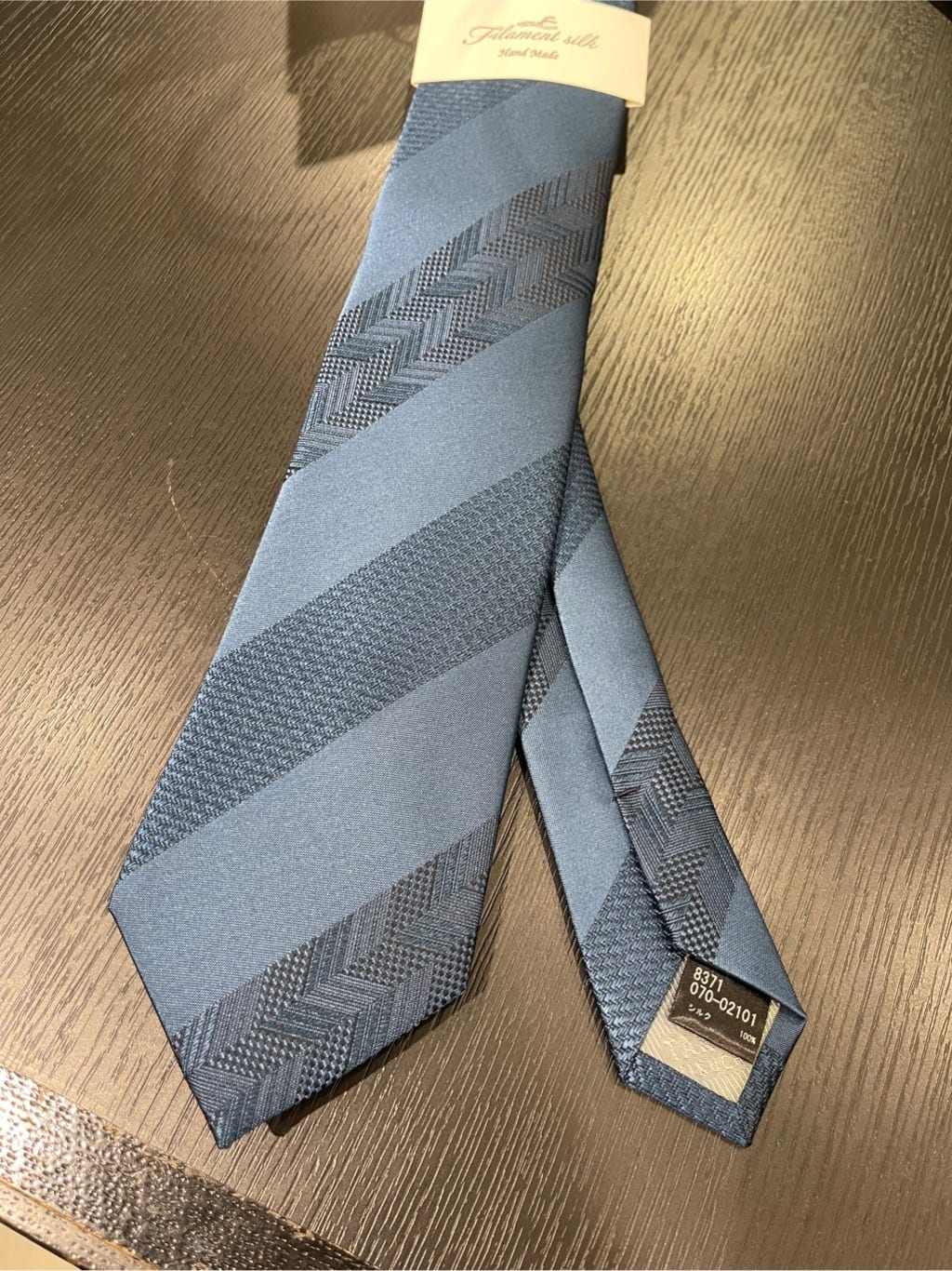 松村泰輔さんの「TAKEO KIKUCHI｜◆【Made in JAPAN】矢絣（やがすり）フィラメントシルク ネクタイ」を使ったコーディネート