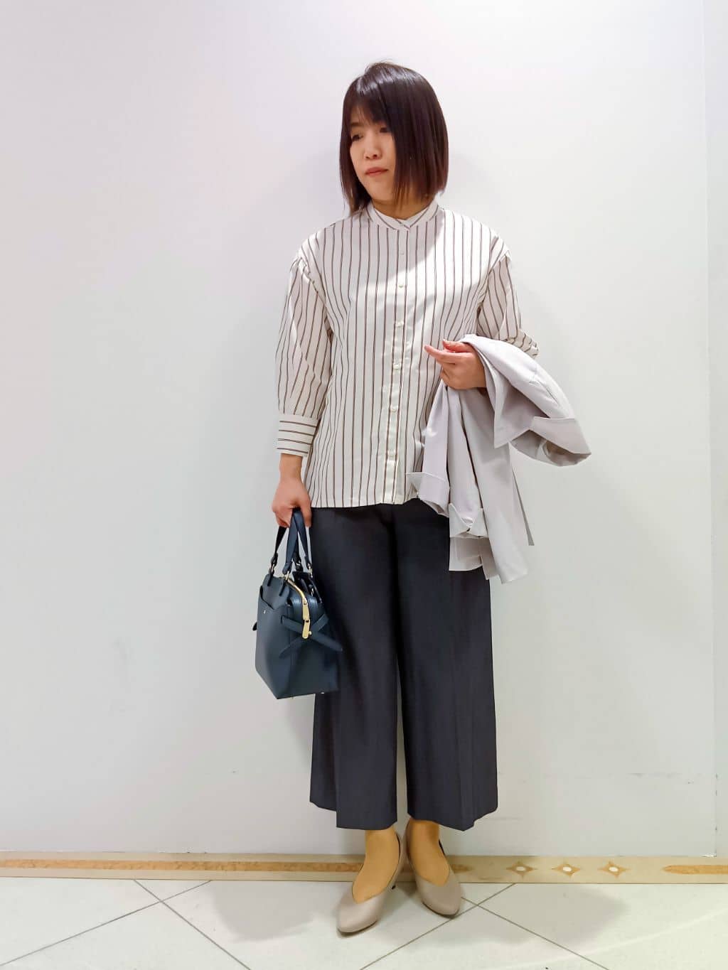 tomoさんの「Reflect｜◆【手洗い可／撥水】ライティミドル丈コート」を使ったコーディネート