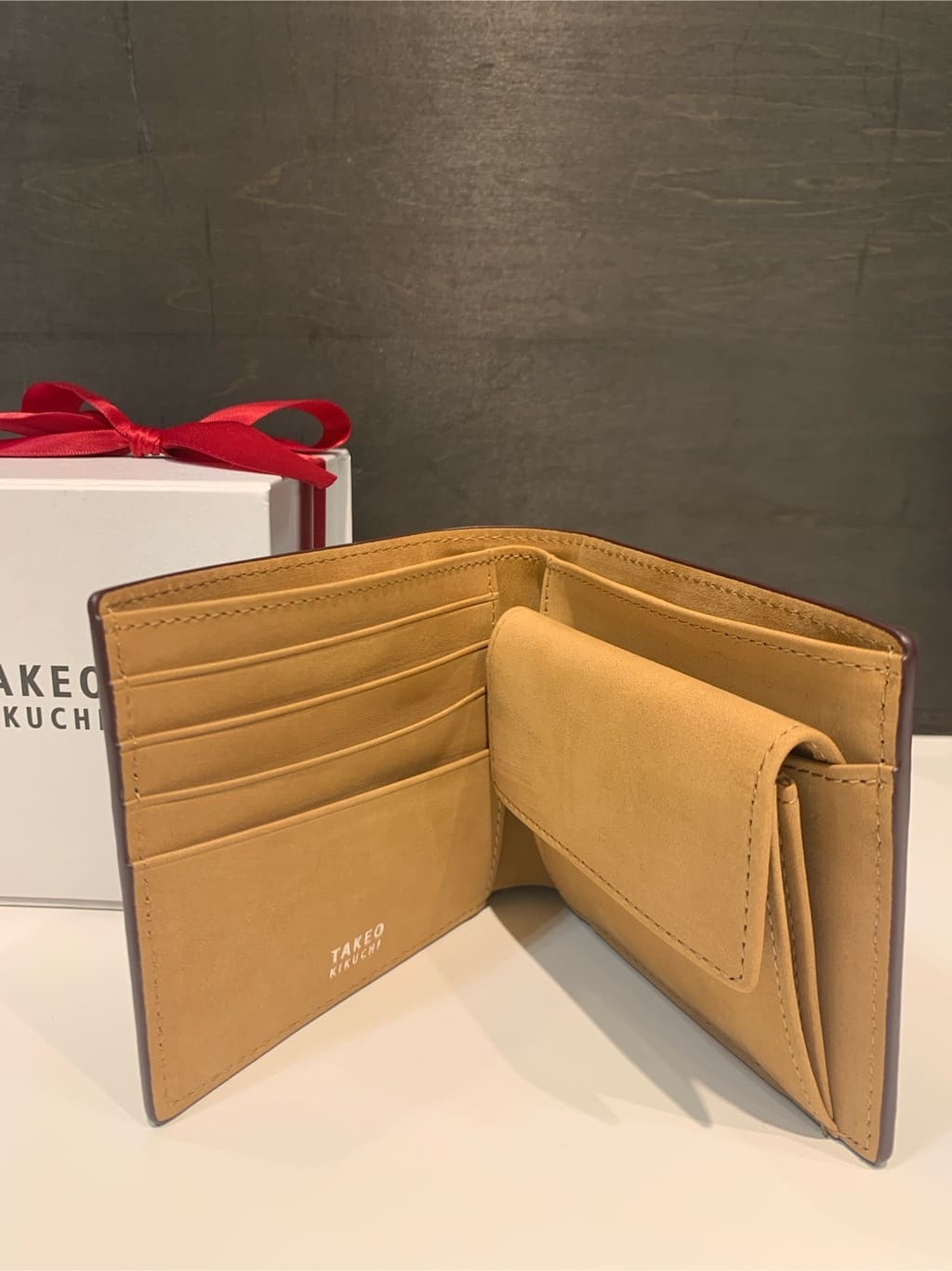 木村剛さんの「TAKEO KIKUCHI｜【ソフト＆ナチュラル】ミニメッシュ レザー 2つ折り財布」を使ったコーディネート