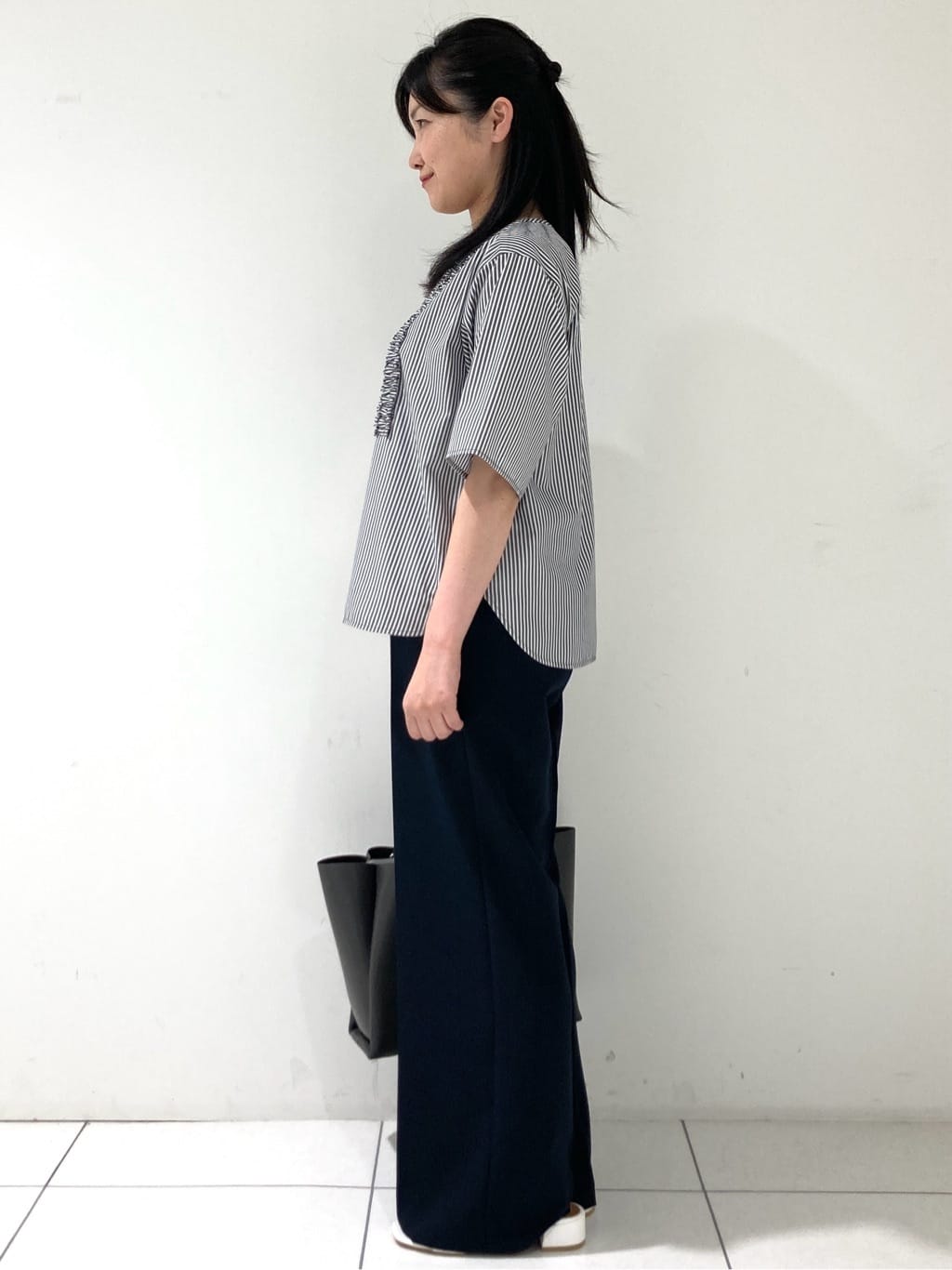 momokoさんの「INDIVI｜【洗える】胸元タックフリルブラウス」を使ったコーディネート