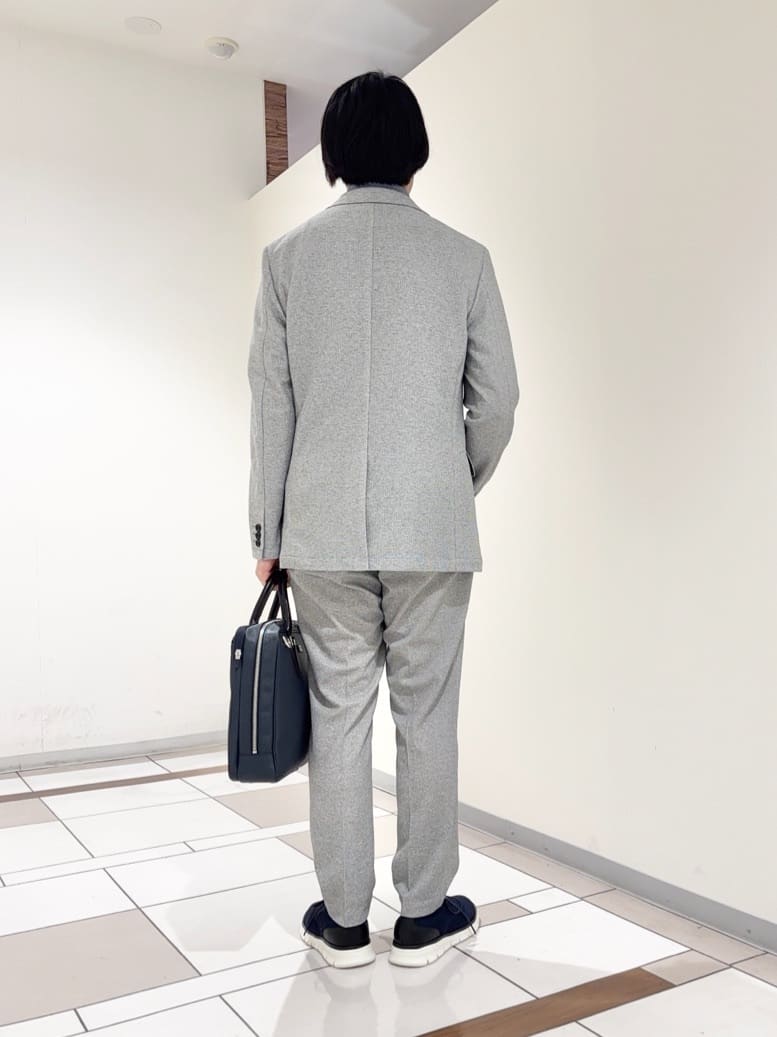 及川さんの「TAKEO KIKUCHI｜コーデュラ（R） コーティング ブリーフケース」を使ったコーディネート