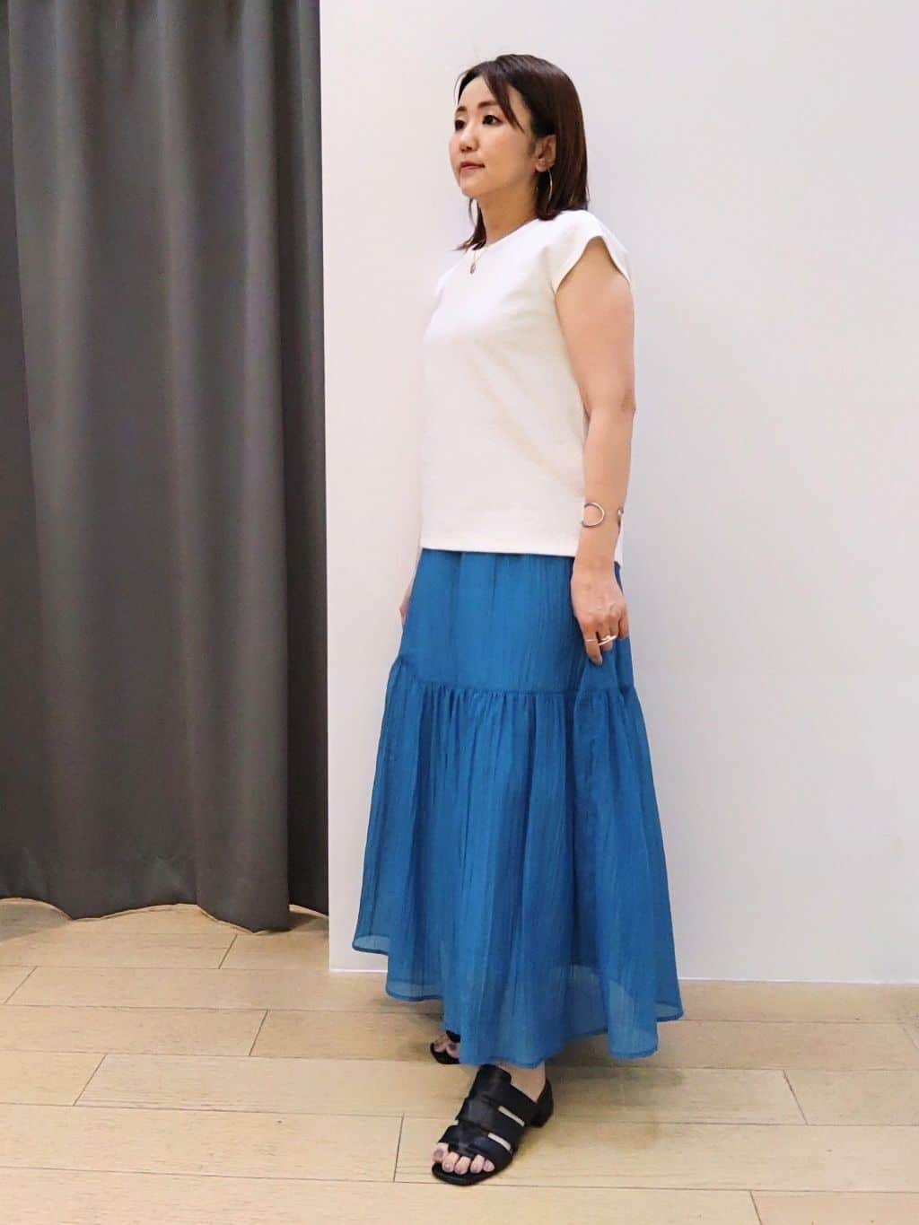 nacoさんの「INDIVI｜【2点セット／着回し◎】ノースリーブ＆ティアードスカート カセット服」を使ったコーディネート