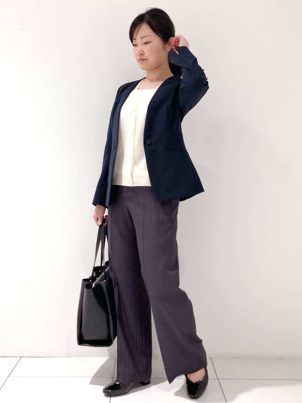 momokoさんの「INDIVI｜【定番スーツ／UVケア／洗える】ウール調ノーカラージャケット」を使ったコーディネート