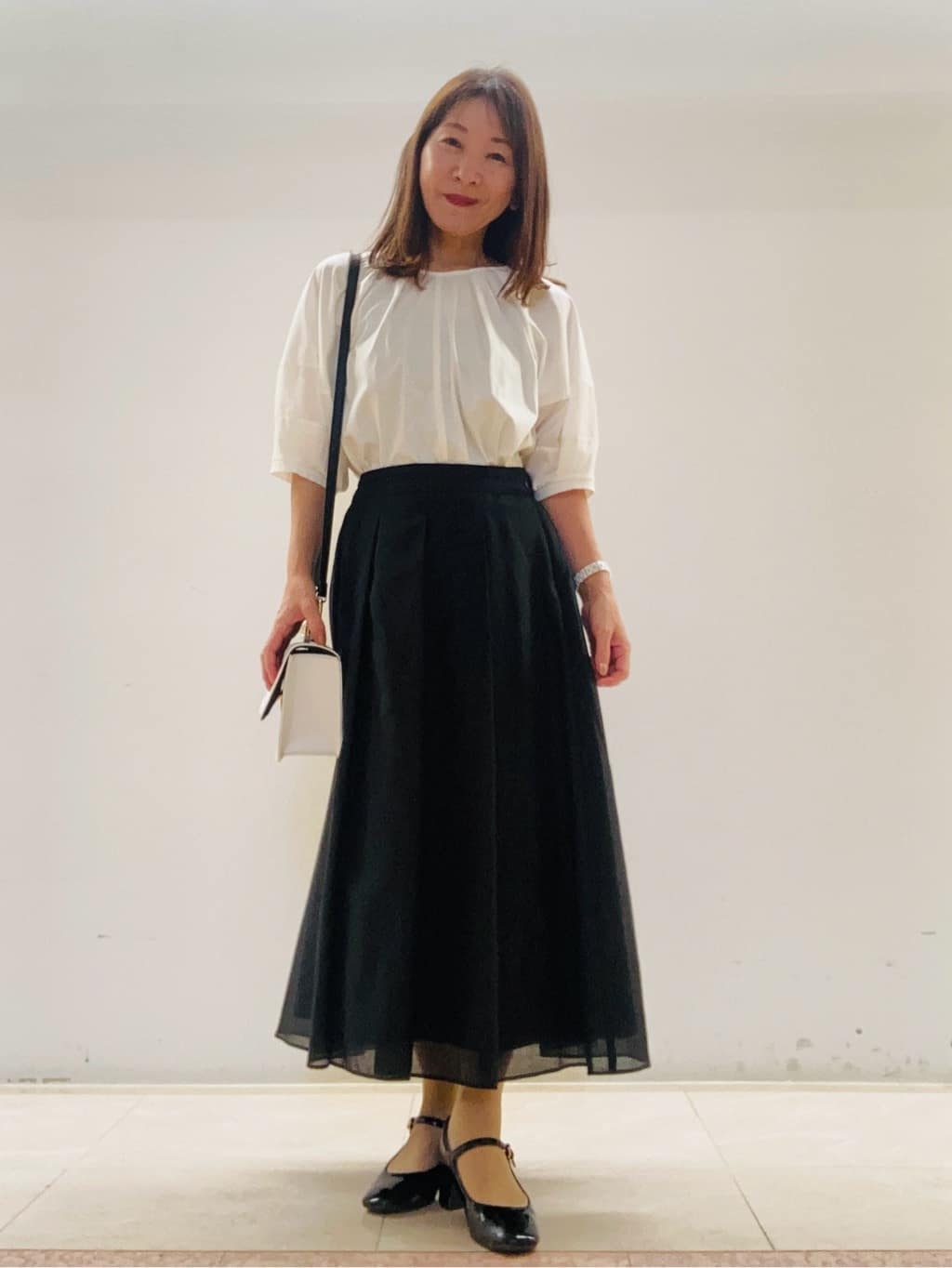 kurodaさんの「Reflect｜【マシンウォッシュ可／セットアップ可】シアーボックスタックプリーツスカート」を使ったコーディネート