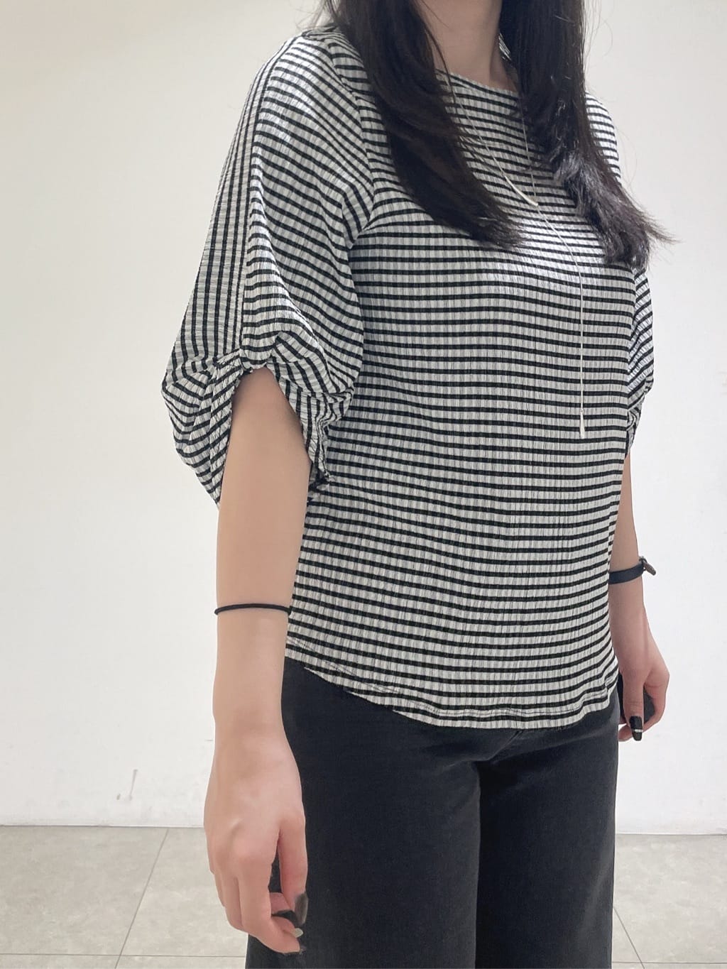 emikaさんの「INDIVI｜【UVケア／吸汗速乾】凹凸素材ねじり袖トップス」を使ったコーディネート
