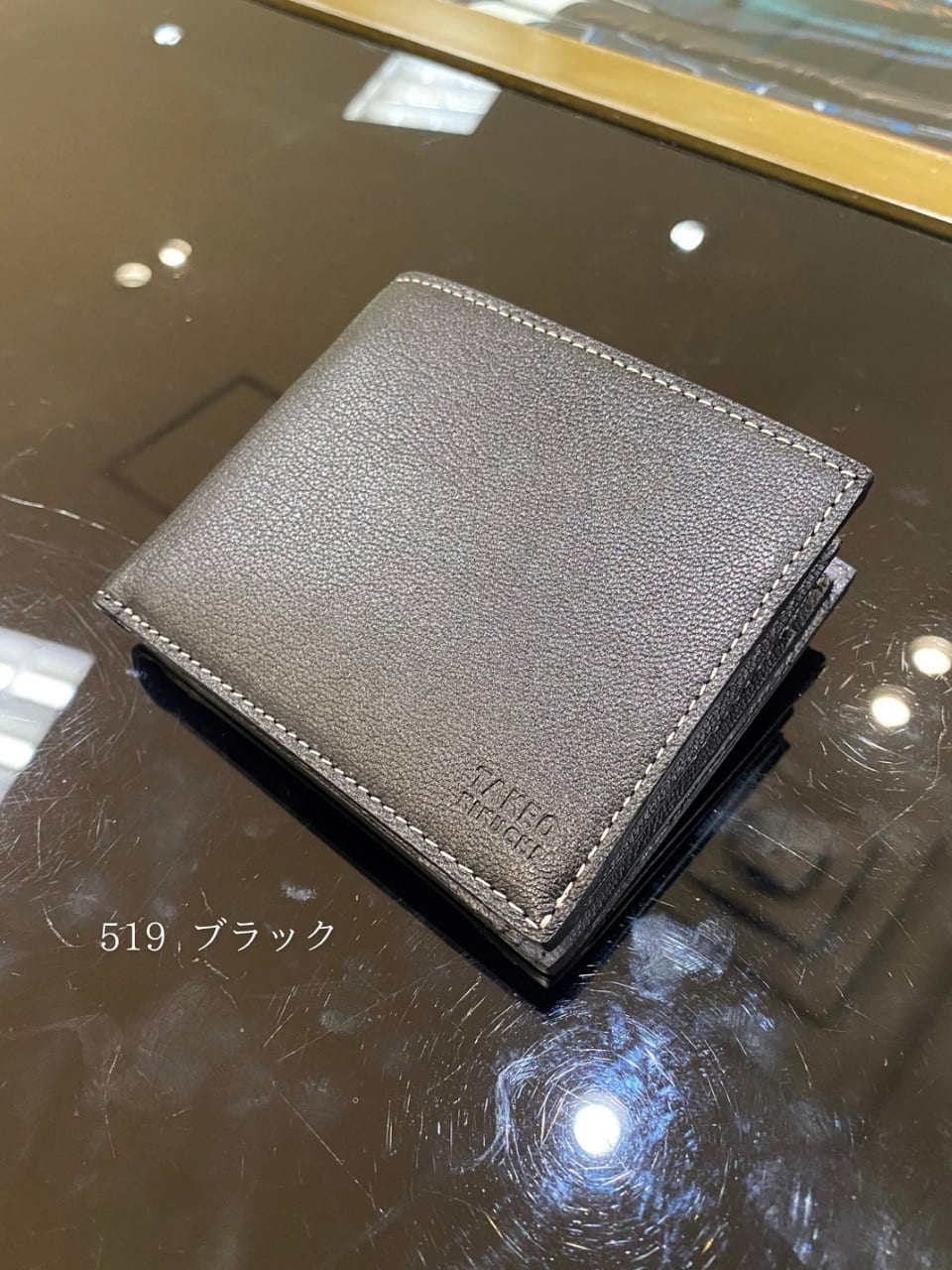 小南大和さんの「TAKEO KIKUCHI｜ゴートスキン 2つ折り財布」を使ったコーディネート