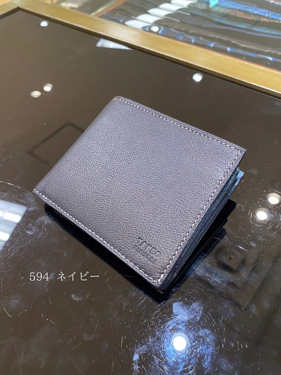 小南大和さんの「TAKEO KIKUCHI｜ゴートスキン 2つ折り財布」を使ったコーディネート
