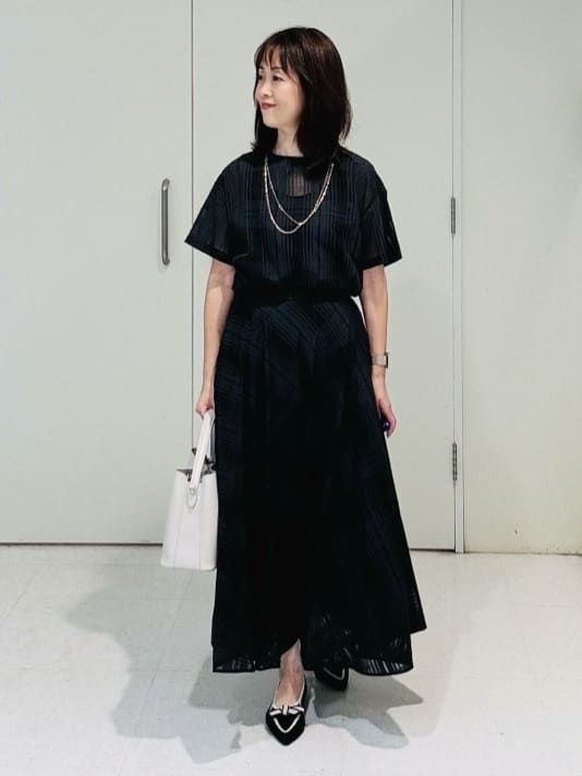 makiさんの「UNTITLED｜【セットアップ可/後ろウエストゴム】シアーチェックスカート」を使ったコーディネート
