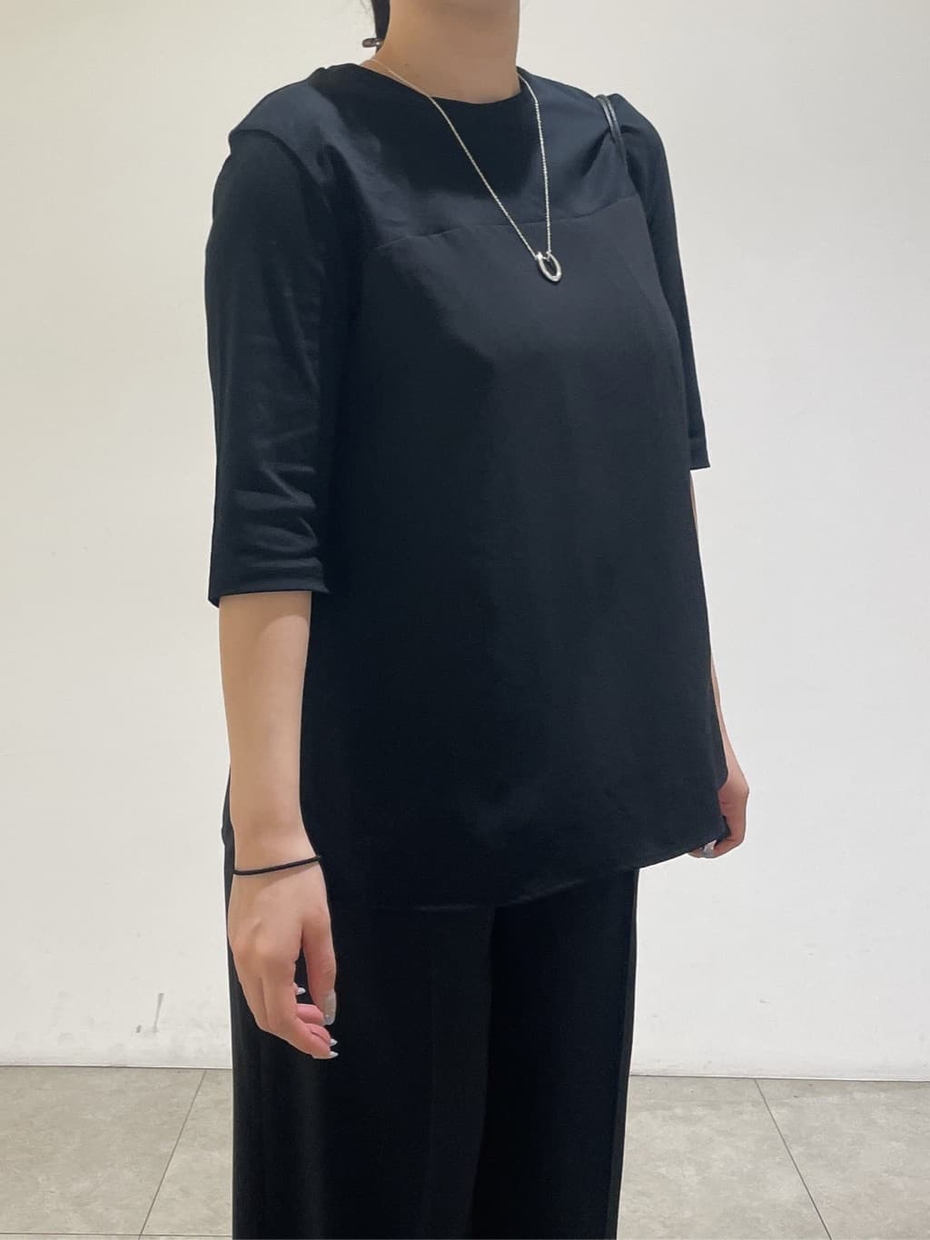 emikaさんの「INDIVI｜【セットアップ可能】ビスチェレイヤード風トップス」を使ったコーディネート