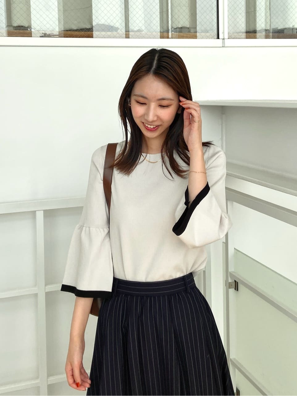 めぐさんの「OPAQUE.CLIP｜ピンストライプレイヤード風フレアスカート【洗濯機洗い可】」を使ったコーディネート