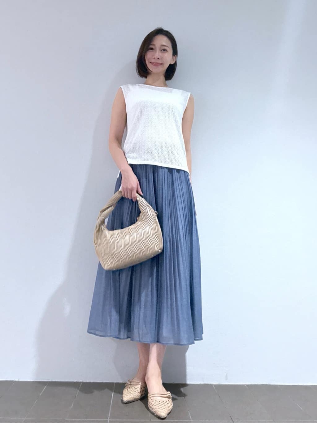 Yukaさんの「COUP DE CHANCE｜【手洗い可】デニム風プリーツスカート」を使ったコーディネート