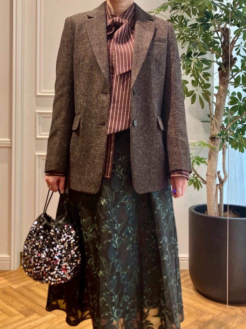 konominさんの「DRESSTERIOR｜スパンコール2WAY巾着バッグ」を使ったコーディネート
