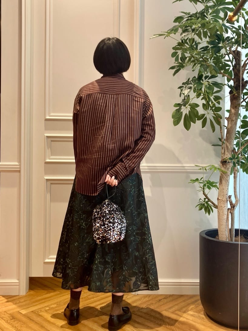 konominさんの「DRESSTERIOR｜スパンコール2WAY巾着バッグ」を使ったコーディネート