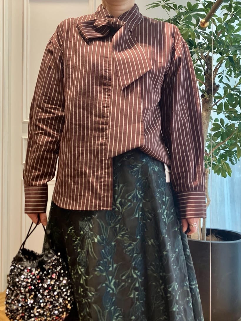 konominさんの「DRESSTERIOR｜スパンコール2WAY巾着バッグ」を使ったコーディネート
