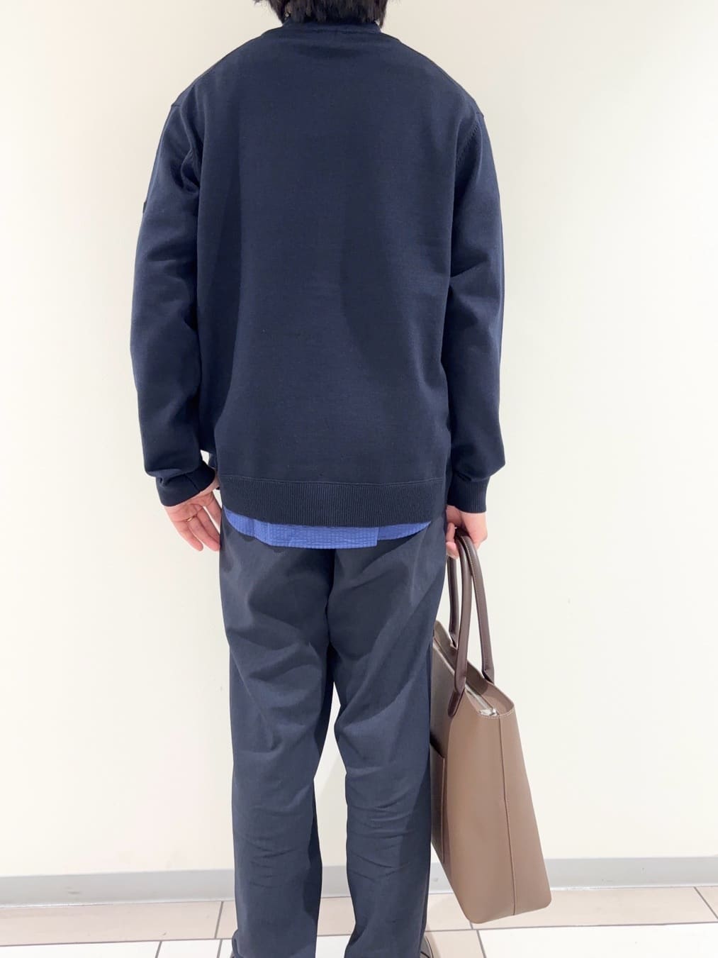 及川さんの「TAKEO KIKUCHI｜アンチピリング ジップアップ ニット」を使ったコーディネート