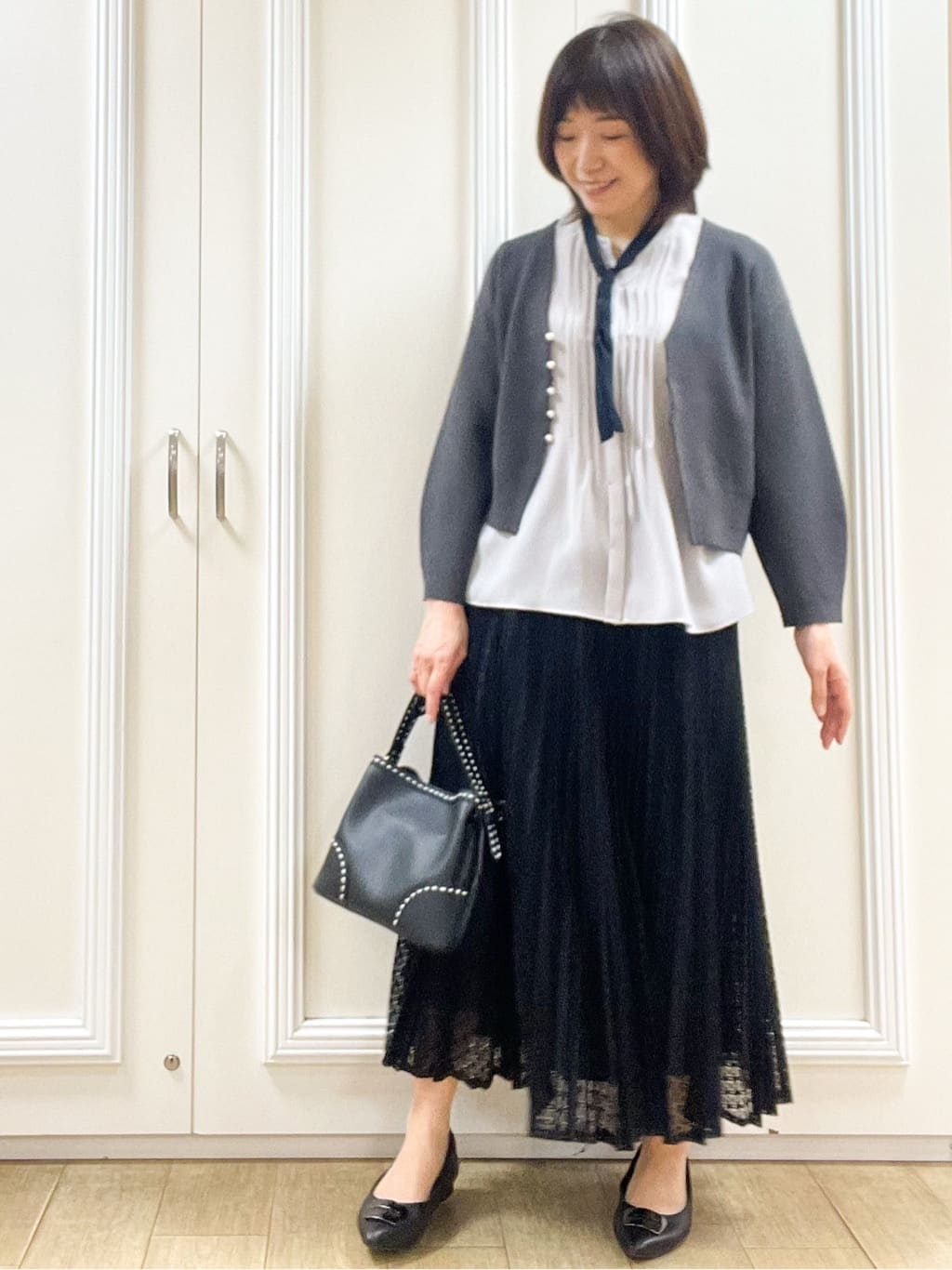 めいさんの「Reflect｜【軽い羽織に◎／セットアップ可】パール調ボタン付きカーディガン」を使ったコーディネート