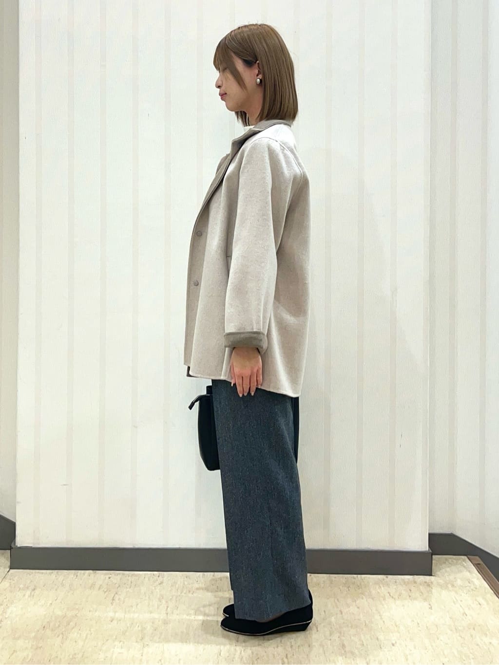 kumiさんの「INDIVI｜【SETUP可能／洗える／UVケア】ライトジャージ ボトルネックトップス」を使ったコーディネート
