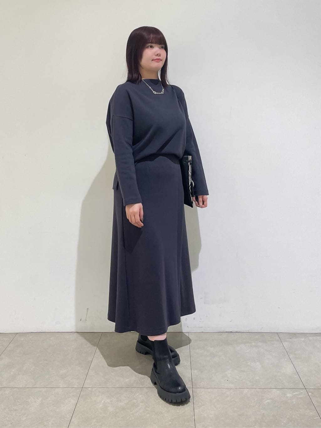 emikaさんの「INDIVI｜【SETUP可能／洗える／UVケア】ライトジャージ ボトルネックトップス」を使ったコーディネート