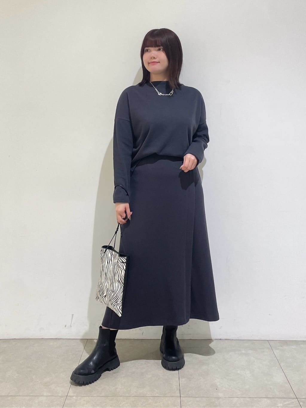 emikaさんの「INDIVI｜【SETUP可能／洗える／UVケア】ライトジャージ ボトルネックトップス」を使ったコーディネート