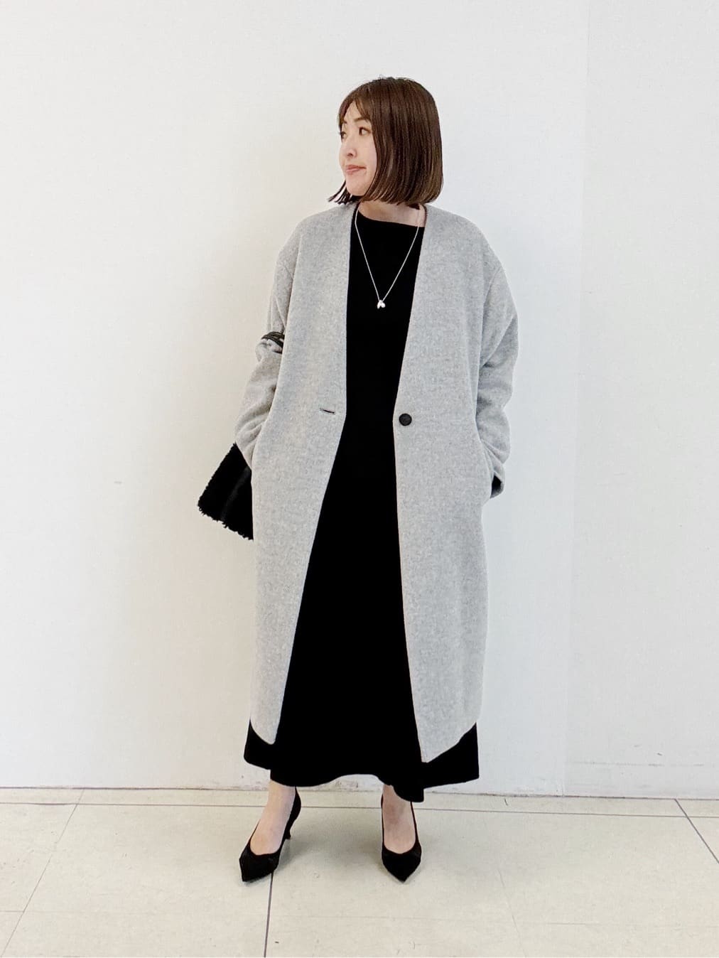 yoshiyaさんの「INDIVI｜【SETUP可能／洗える／UVケア】ライトジャージ ボトルネックトップス」を使ったコーディネート