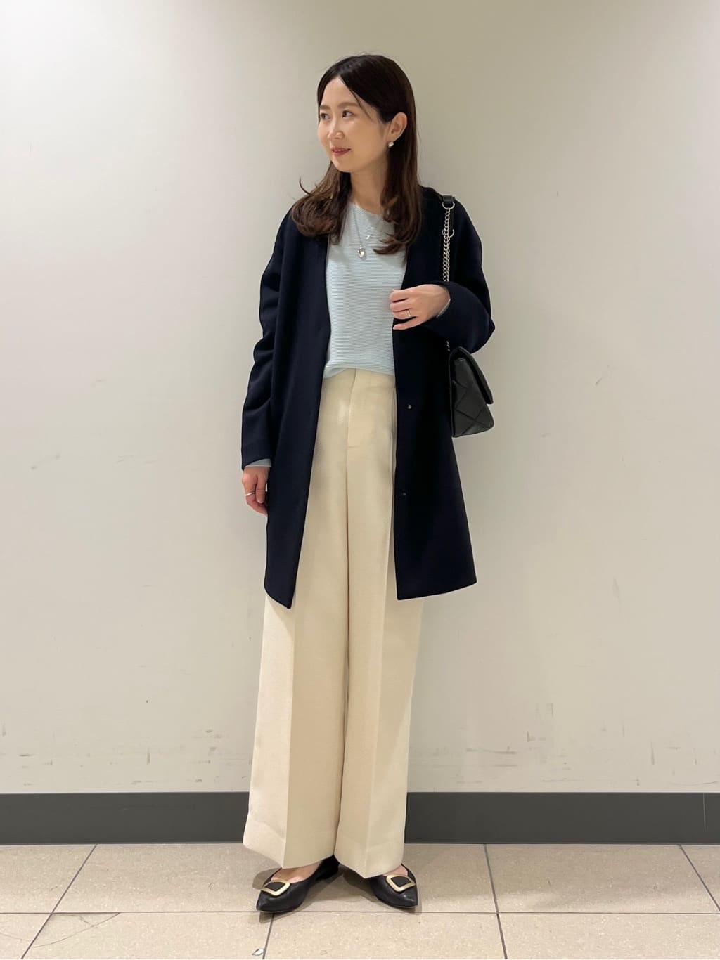 shokoさんの「INDIVI｜【ウール混ラメ素材】Vネック煌めきニット」を使ったコーディネート