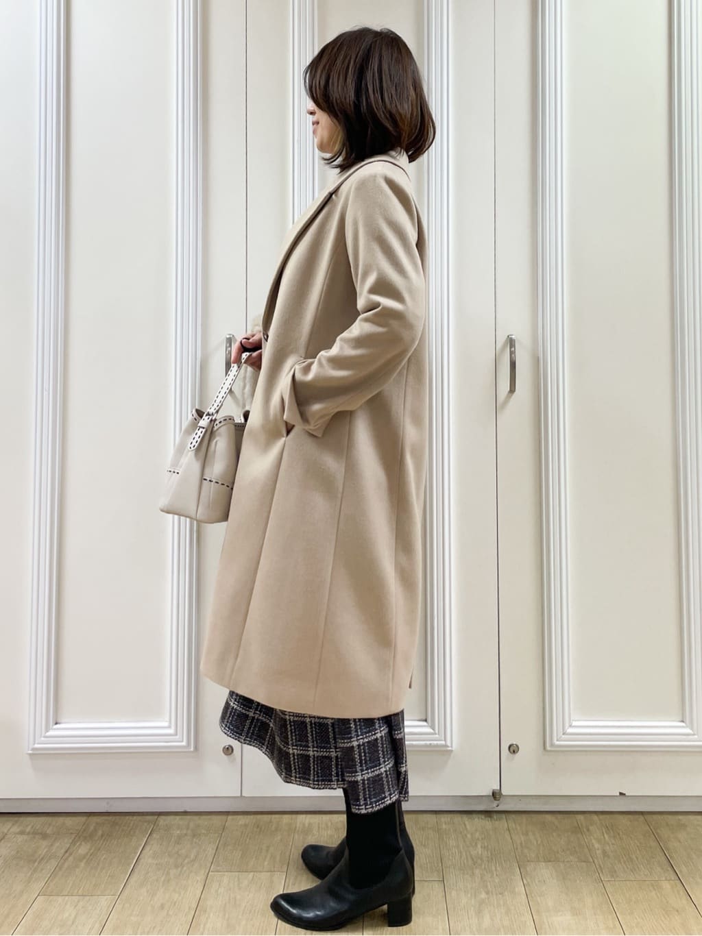 めいさんの「Reflect｜【コートインでもすっきり◎】チェック柄ニットドッキングワンピース」を使ったコーディネート