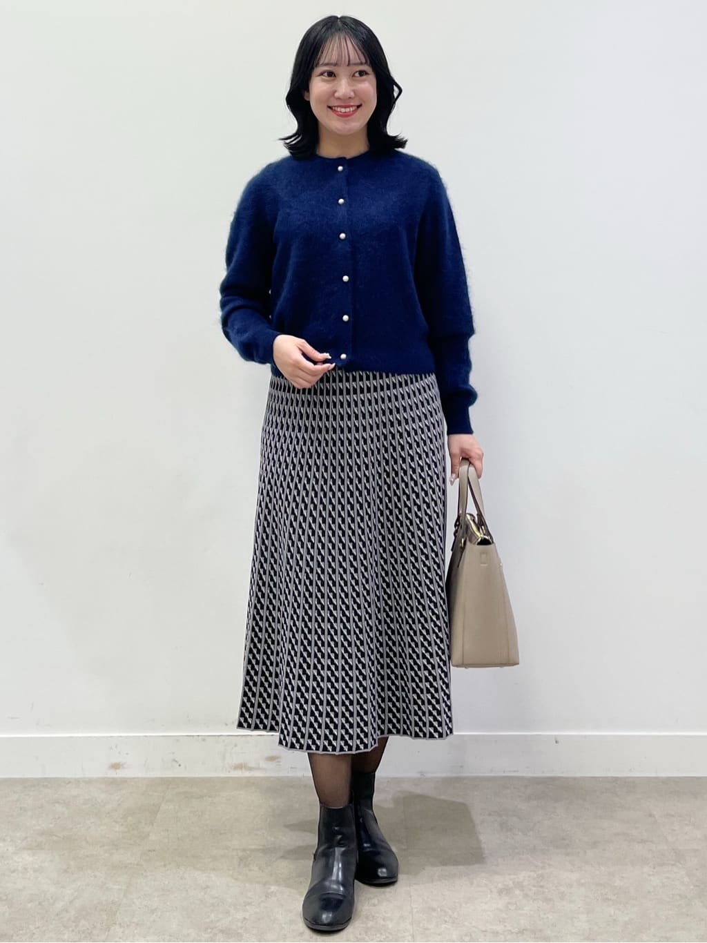 yukariさんの「Reflect｜【WEB先行カラーあり／セットアップ可】幾何調柄ニットスカート」を使ったコーディネート