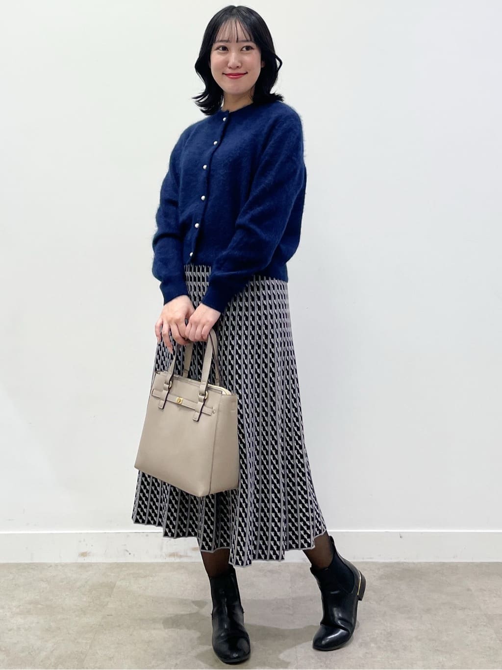 yukariさんの「Reflect｜【WEB先行カラーあり／セットアップ可】幾何調柄ニットスカート」を使ったコーディネート