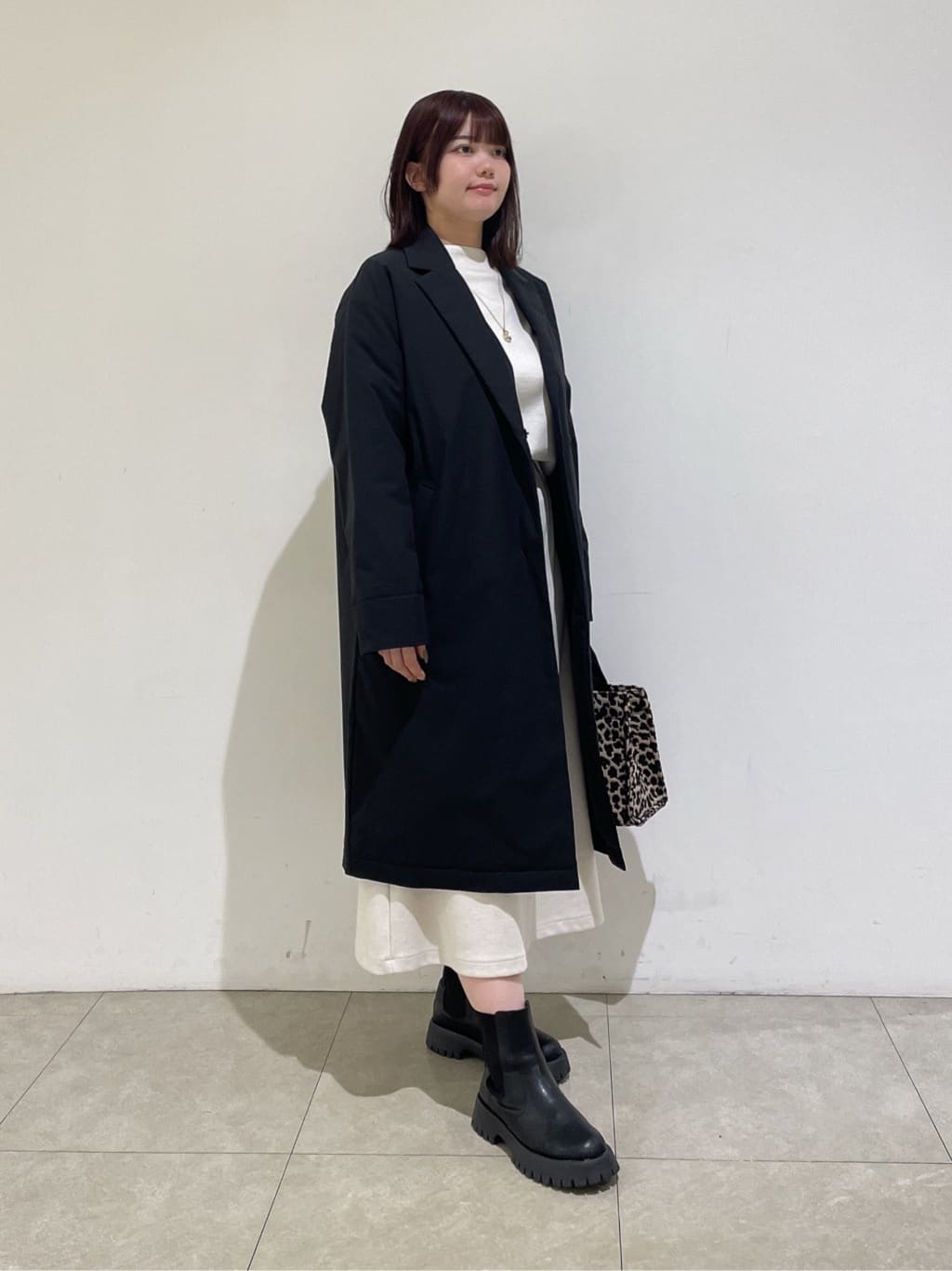 emikaさんの「INDIVI｜【SETUP可能／洗える／UVケア】ライトジャージ ボトルネックトップス」を使ったコーディネート