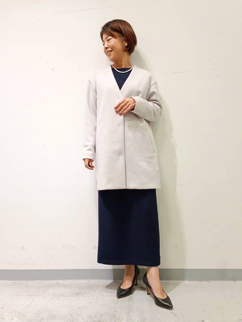 Kさんの「INDIVI｜【秋／軽羽織り】ノーカラーミドル丈ライトコート」を使ったコーディネート