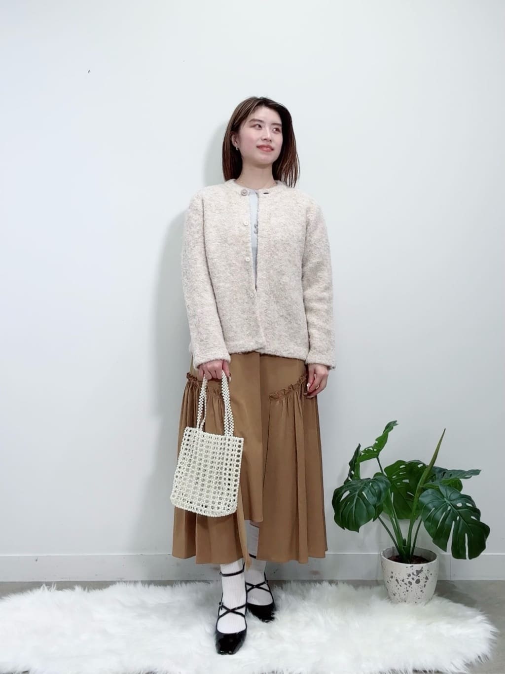 Suma Una本部スタッフさんの「SunaUna｜【ループヤーン／ふんわり】ミドル丈カーディガン」を使ったコーディネート