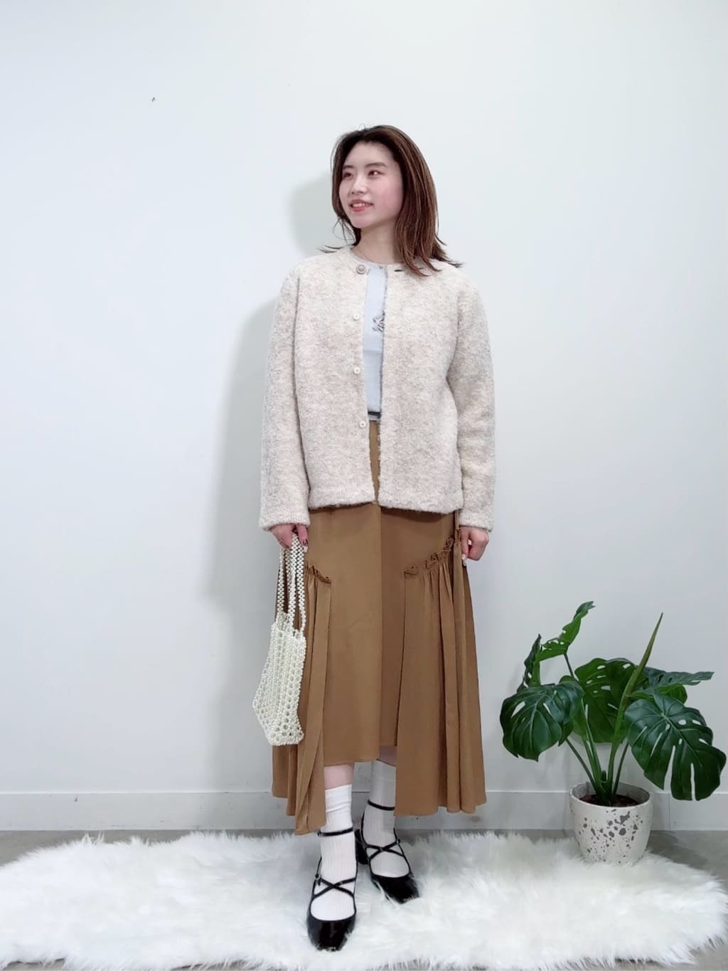 Suma Una本部スタッフさんの「SunaUna｜【ループヤーン／ふんわり】ミドル丈カーディガン」を使ったコーディネート